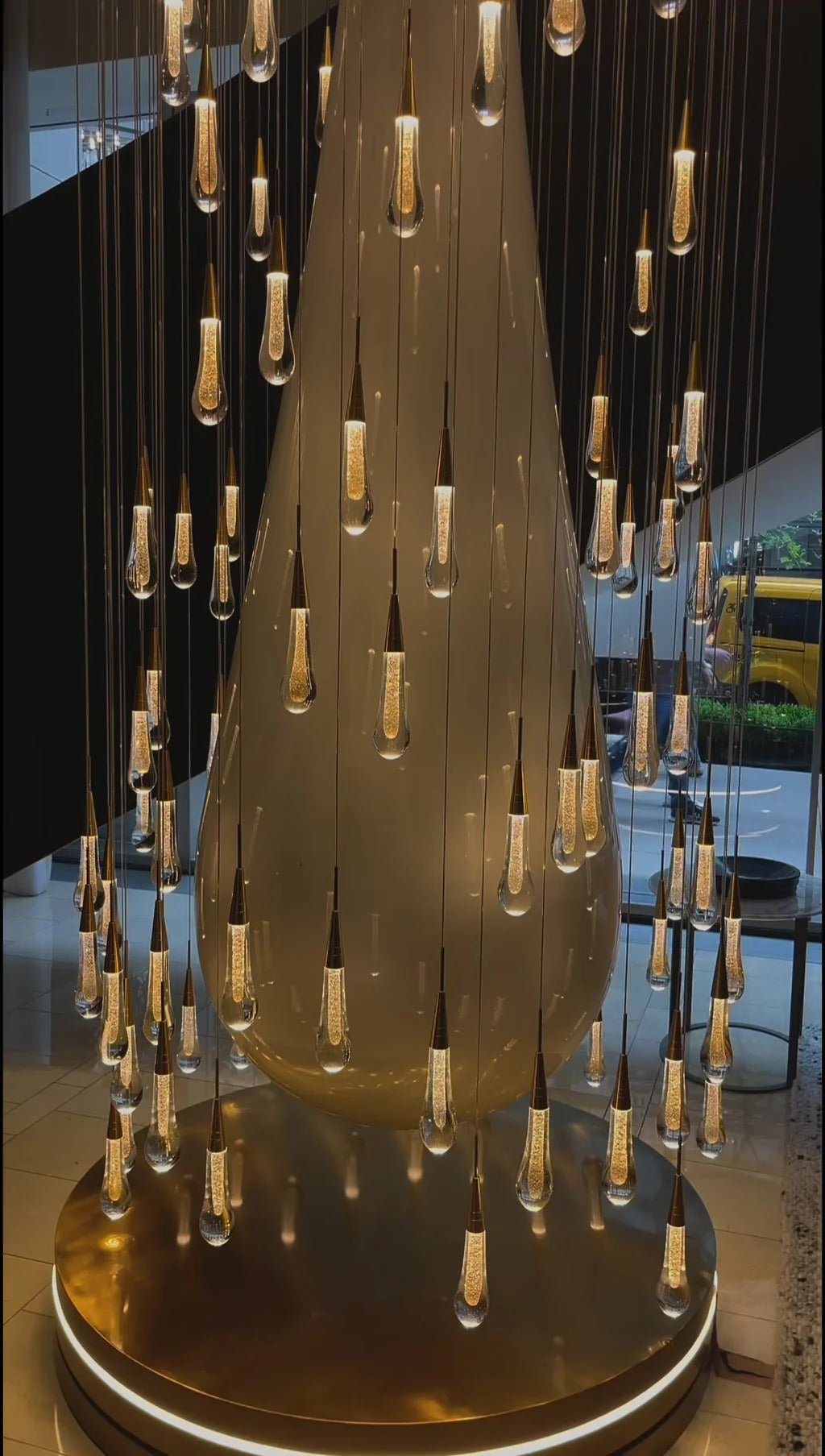 Spiral Raindrop Staircase Ceiling Lighting thumbnail view of cascading raindrop chandelier