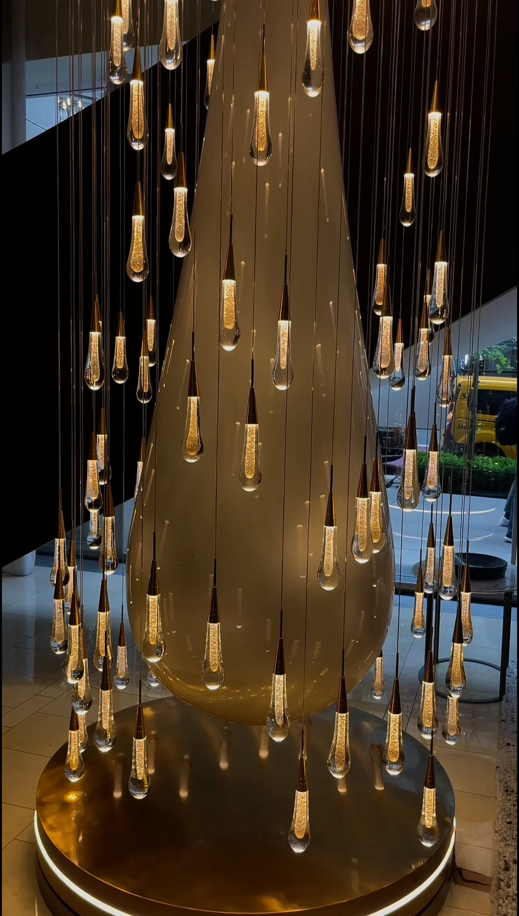 Spiral Raindrop Staircase Ceiling Lighting video still of raindrop chandelier for staircase