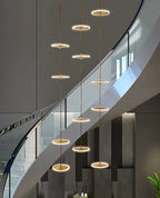 Spiral round Scandinavian chandelier lighting detail for staircase