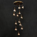 Tenza Modern Staircase Chandelier with clear glass ball pendants arranged in a spiral 9 light design