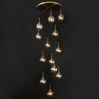 Tenza Modern Staircase Chandelier with smoky glass ball pendants and warm integrated lights