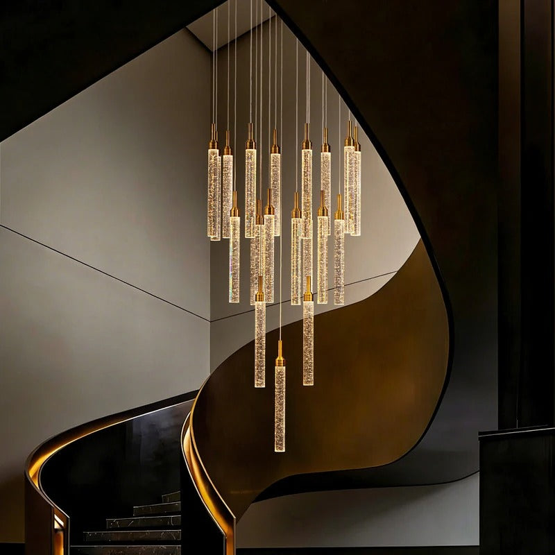 Uly Gold Crystal Chandelier for Staircase and Foyer installed beside a curved staircase