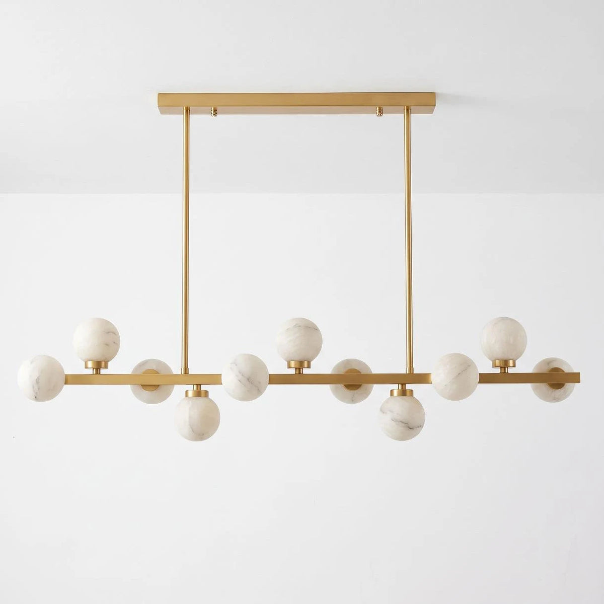 Valtherion Alabaster Globe Linear Chandelier — L 120cm x H 27cm / L 47.2″ x H 10.6″ / Brushed Brass & White