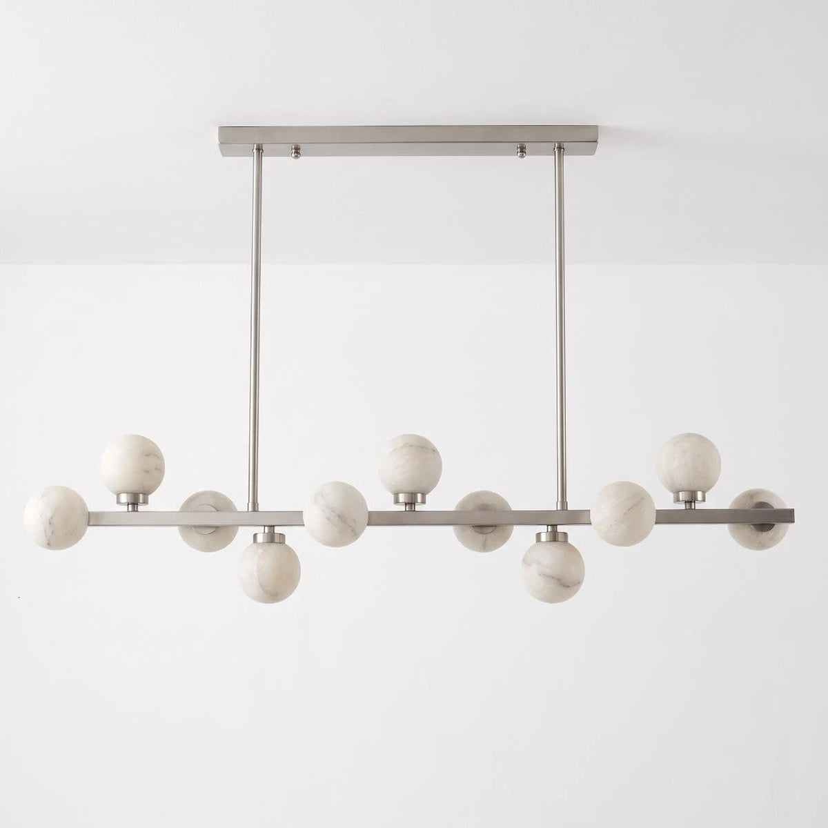 Valtherion Alabaster Globe Linear Chandelier — L 120cm x H 27cm / L 47.2″ x H 10.6″ / Brushed Nickel & White