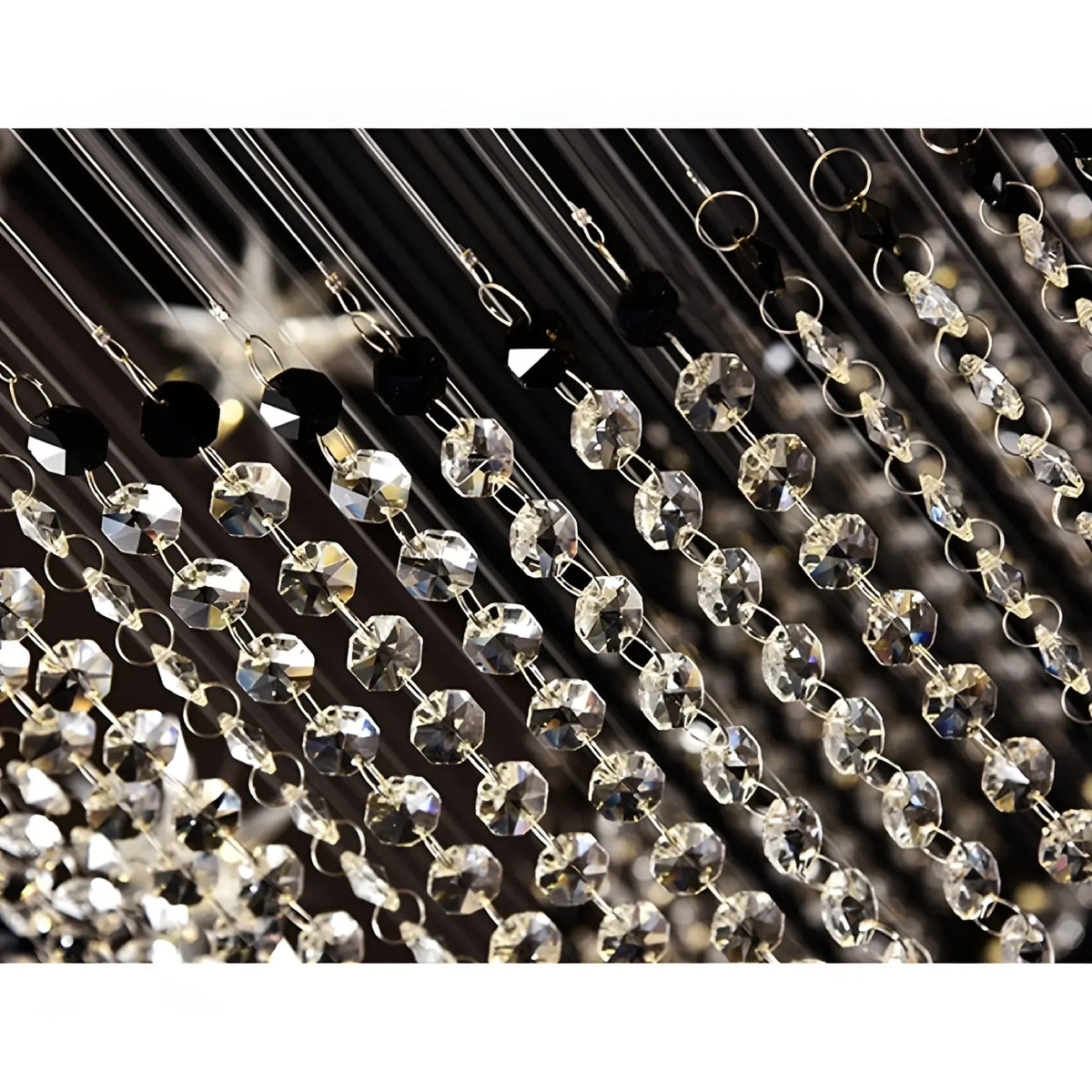 Vena Spiral Raindrop Crystal Chandelier for Staircase installed in a tall stairwell