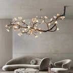 Wanos Ceramic Flower Branch Chandelier installed in a staircase space.
