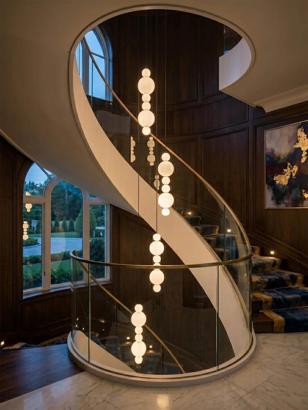 White Multi Globe Pendant Light for Staircase and High Ceiling installed beside a curved staircase