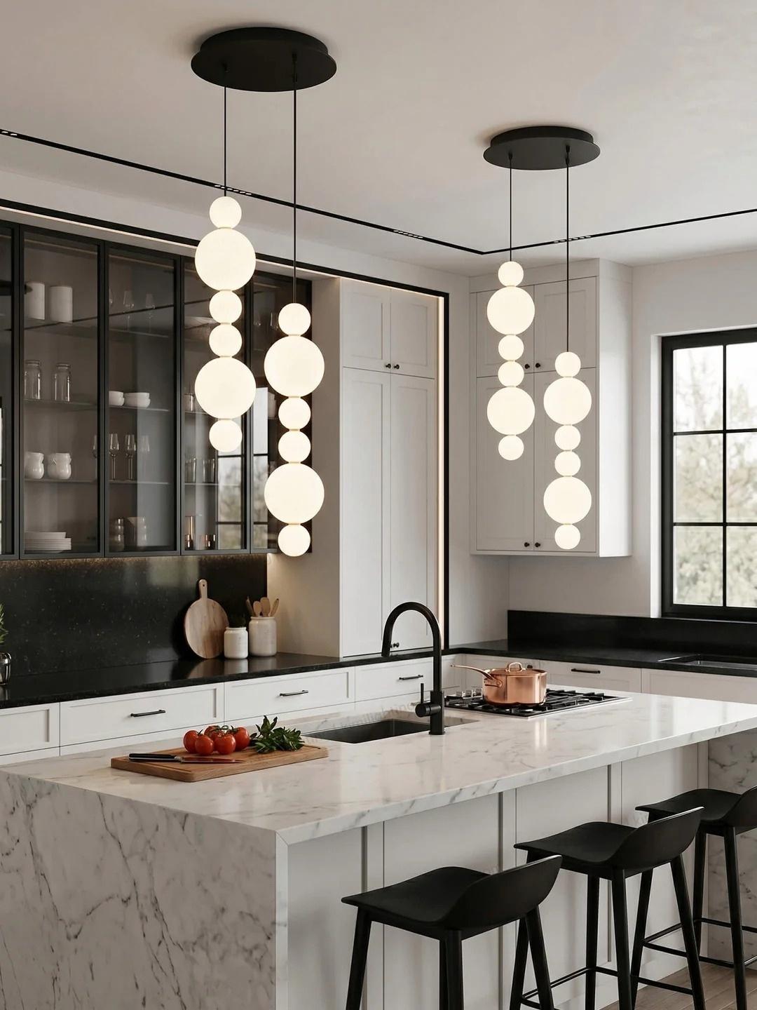 White Multi Globe Pendant Light for Staircase and High Ceiling over a marble kitchen island