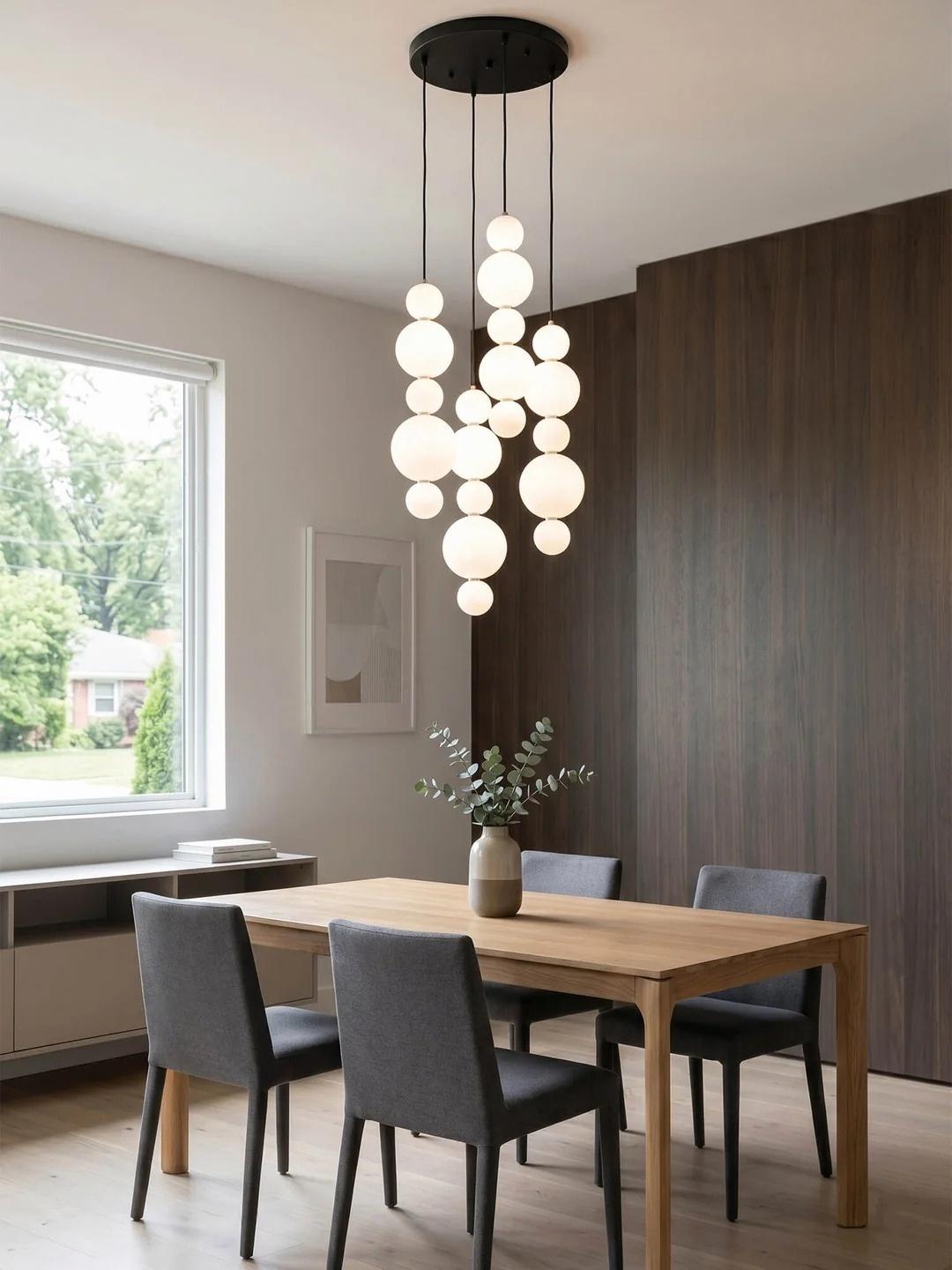 White Multi Globe Pendant Light for Staircase and High Ceiling over a dining table in a modern lounge